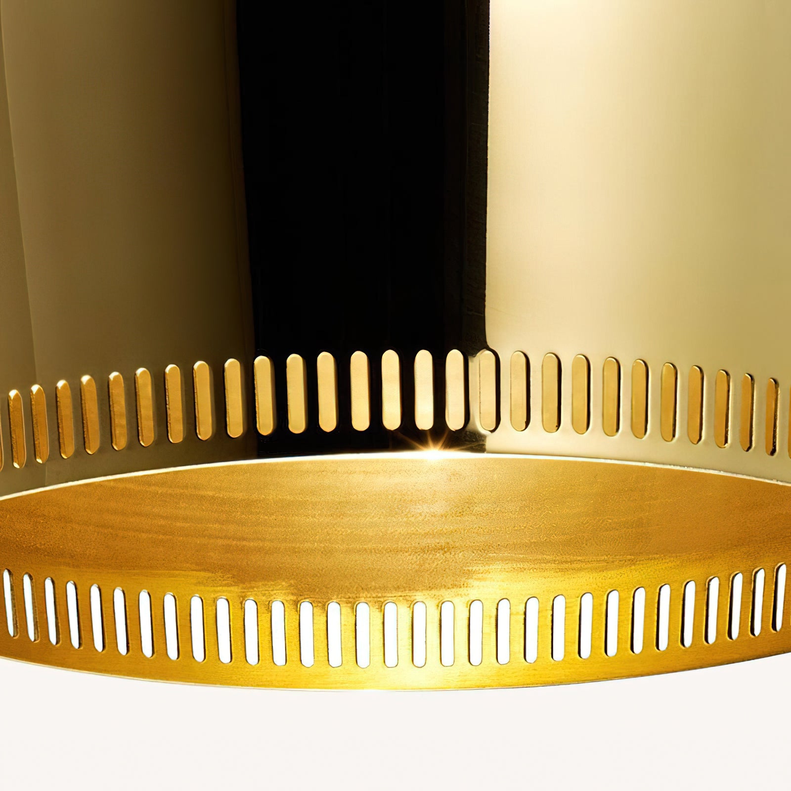 Perforated lower edge detail on the pendant light