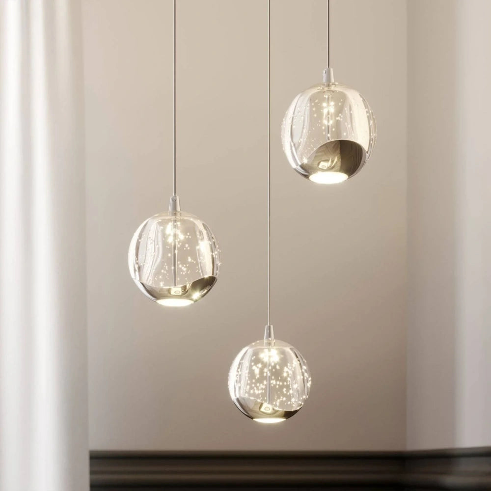 Lampada a sospensione in vetro Isenrya Nordic Orb (6).webp__PID:42fd4d9c-4f2a-40f4-83c9-4100e54c0066