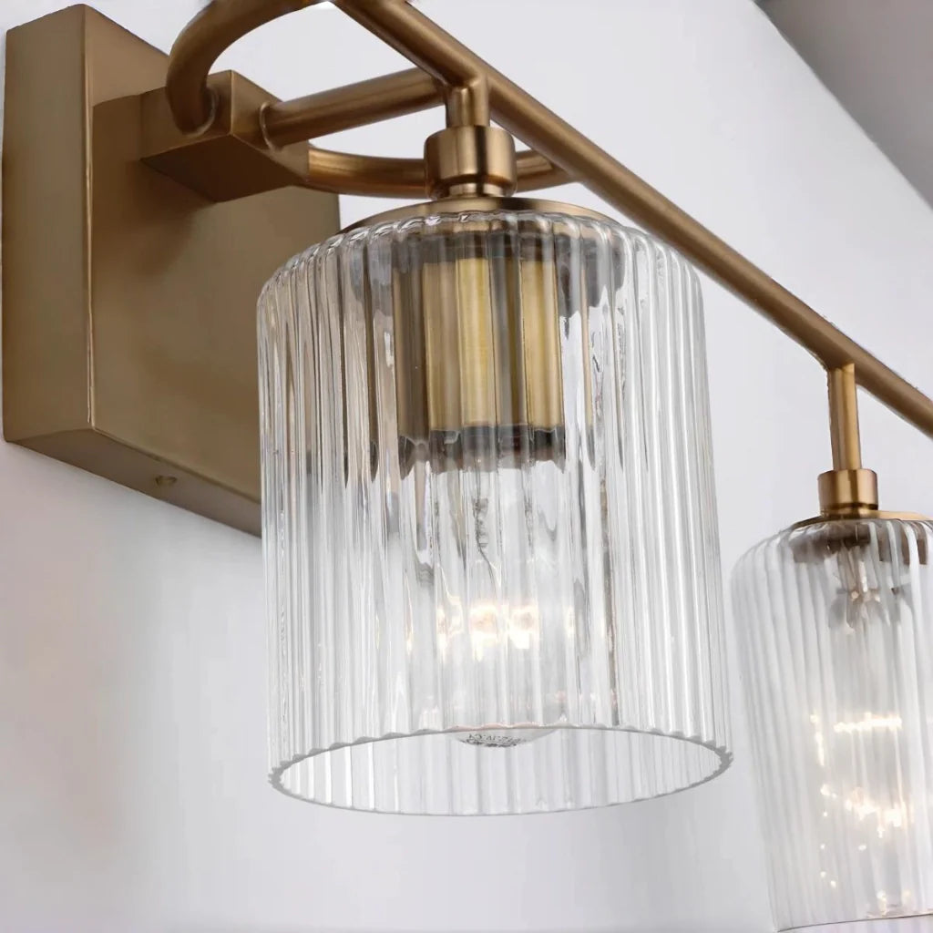Eliot_Modern_3-Lichts_Geribbelde_Glas_Cilinder_Vanity_Wall_Lamp-xj3.webp__PID:db0a2a29-708b-497f-be0c-45cc8aae626e