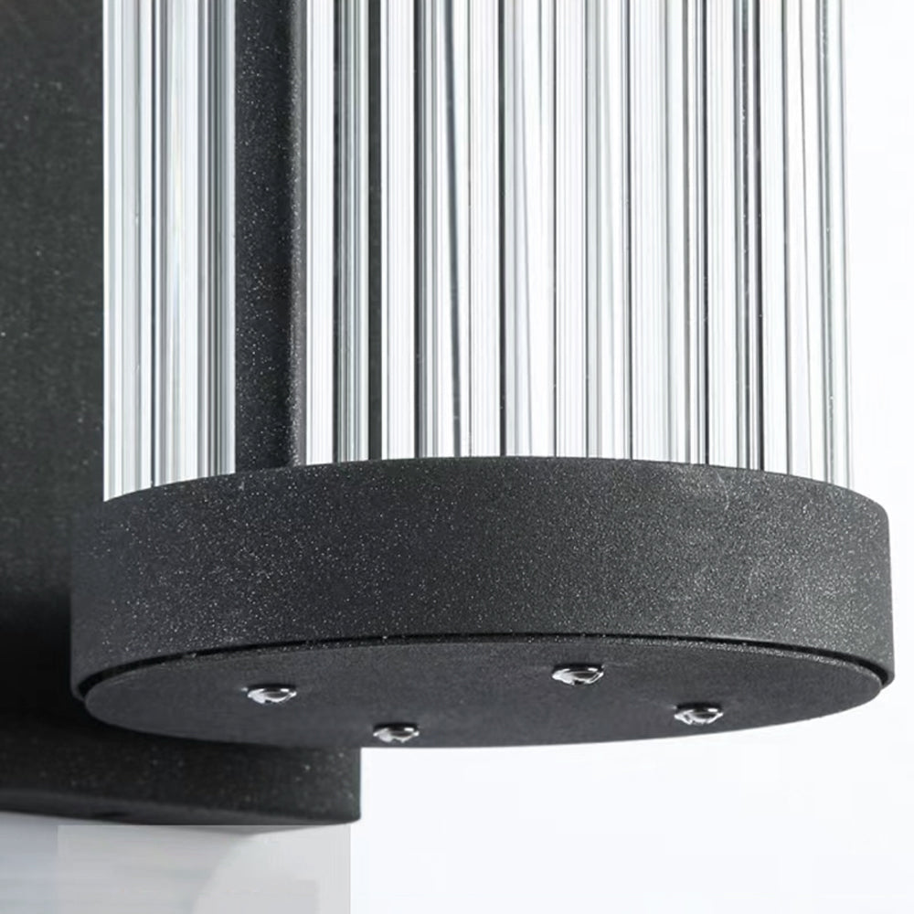 Eirulys moderne zylindrische Glaswandleuchte – Detail (1).webp__PID:26f61f3e-c70b-496c-9972-ef9536583cf6