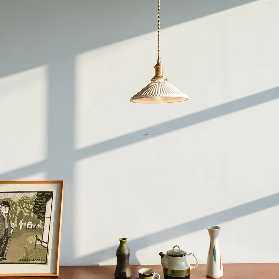 Hecate-Pleated-Hat-Shape-Ceramic-Pendant-Light.webp__PID:b2d9b091-ccc2-4795-a3b9-54cff9e11224