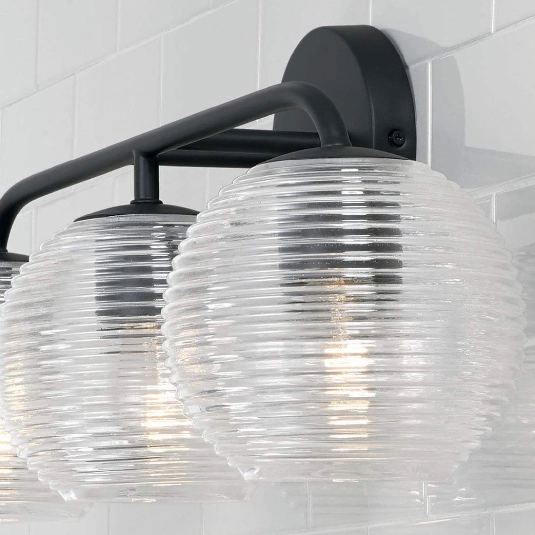 Huxley Minimalist 3-Light Ribbed Glass Wall Light detail.webp__PID:88977339-6343-4fcf-9fed-823da44ef793