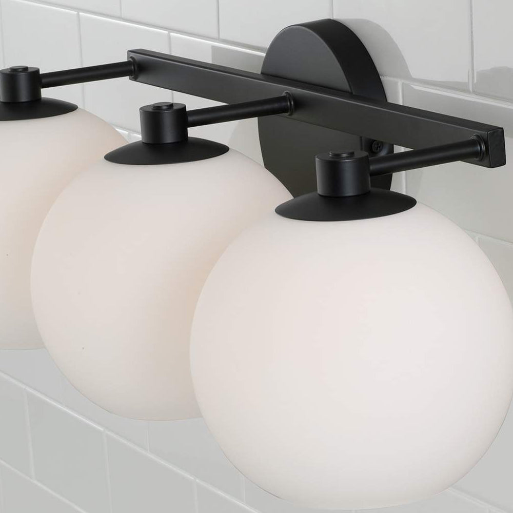 Lucas Modern Triple White Globe Wall Sconce2.webp__PID:e3eec2e2-c330-4998-9429-20dd0e9a676e
