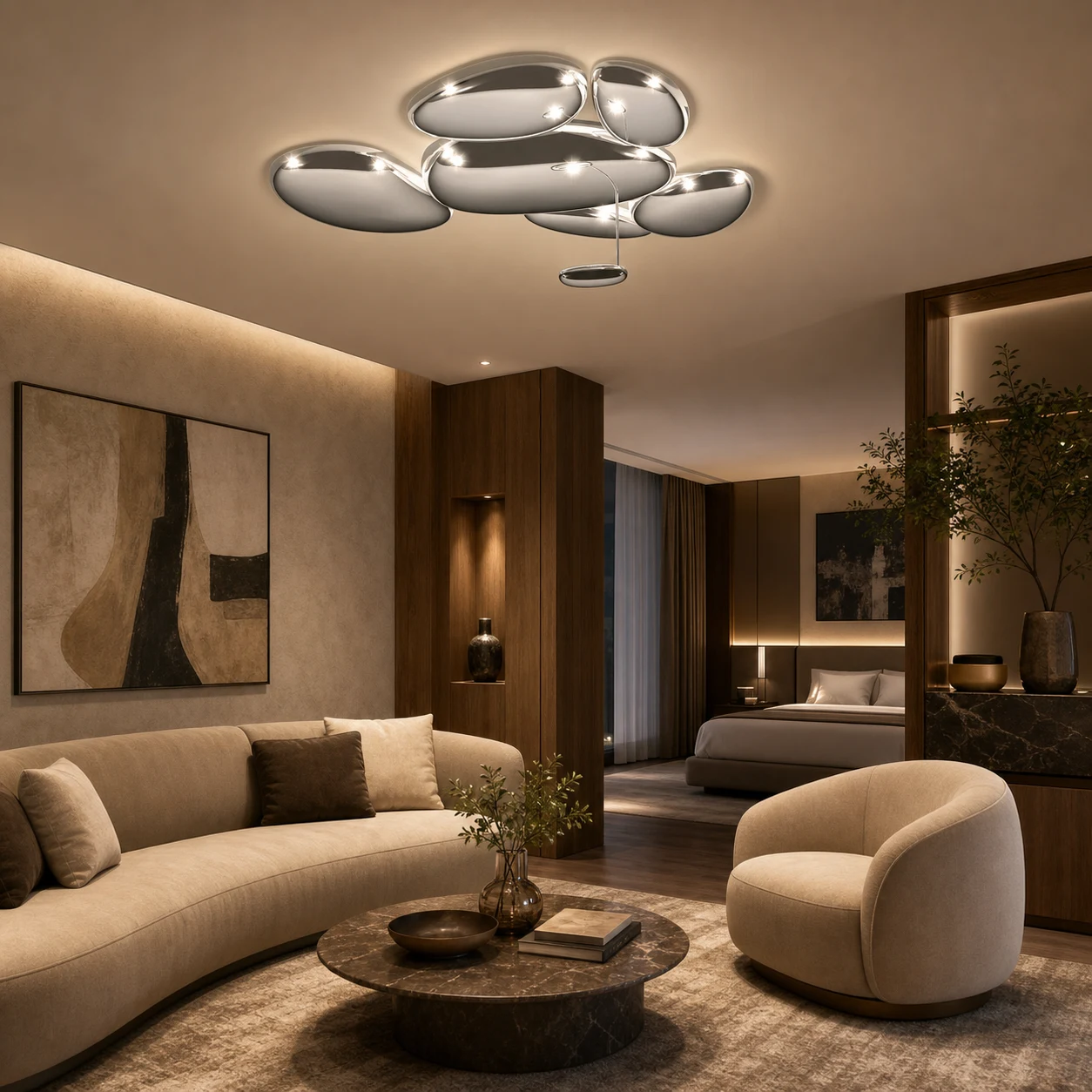 Chromowana lampa sufitowa w kształcie kamyka w apartamencie hotelowym