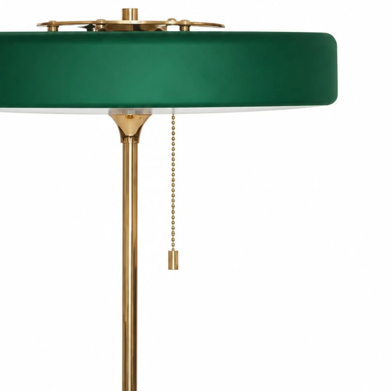 Close detail of the brass pull chain and green shade