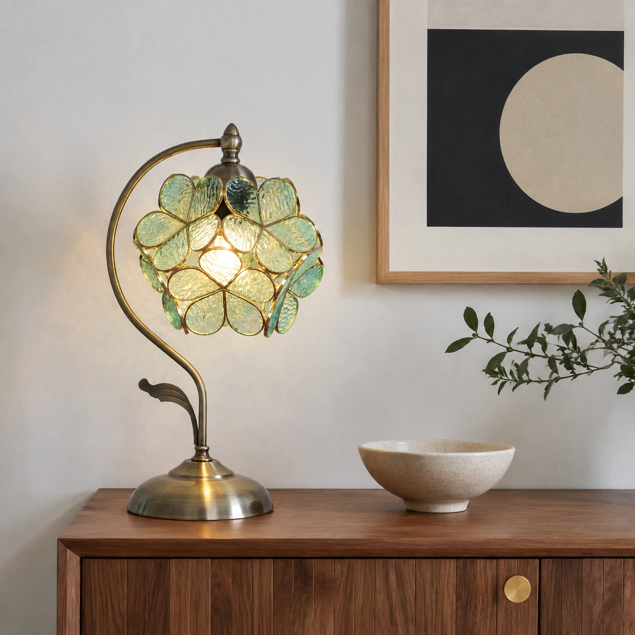 Tiffany petal glass table lamp on a walnut console
