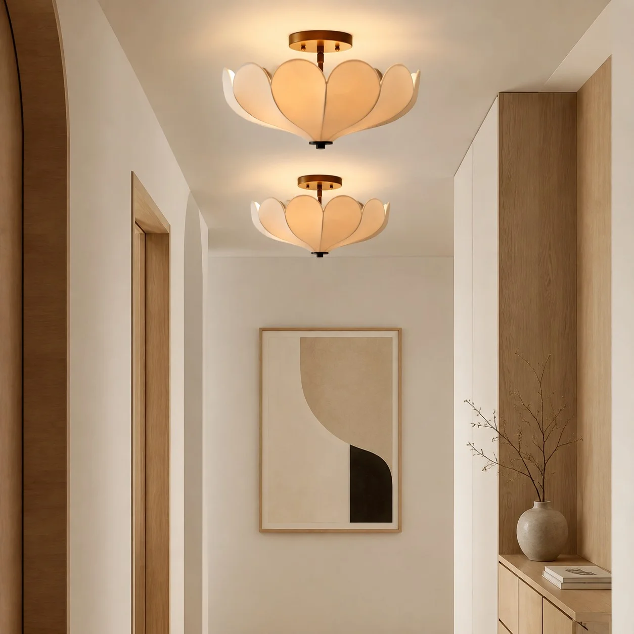 Warm ceiling lights illuminating a hallway
