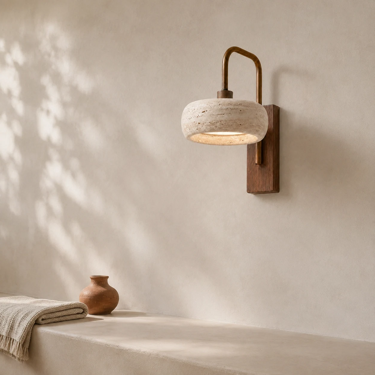 Ianis travertine wall sconce in a Nordic hallway