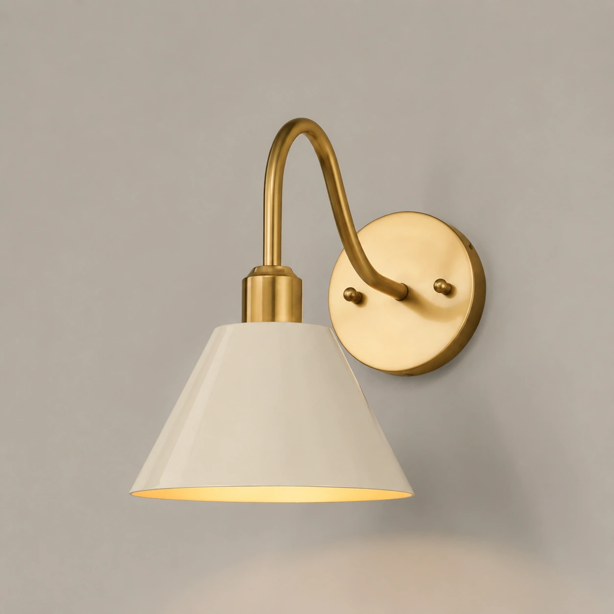 Bone White Penia wall sconce on a light studio wall