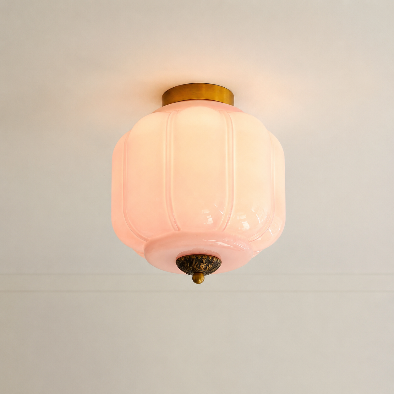 Pink Karen ceiling light switched on