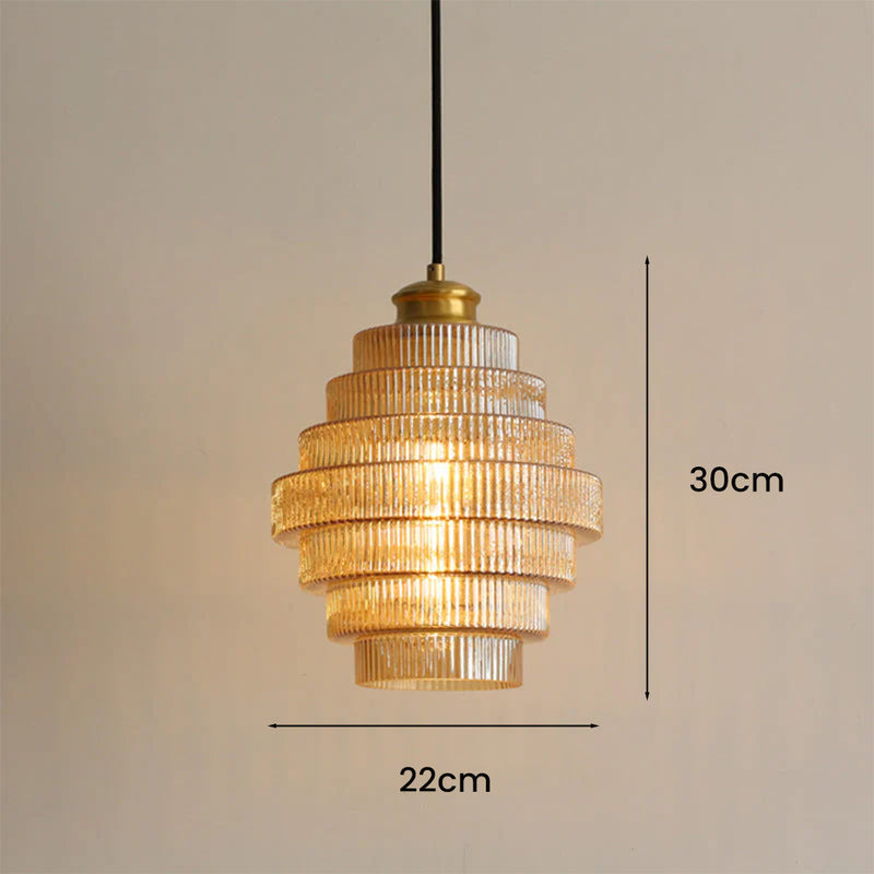 Two Pink pendants above a kitchen island