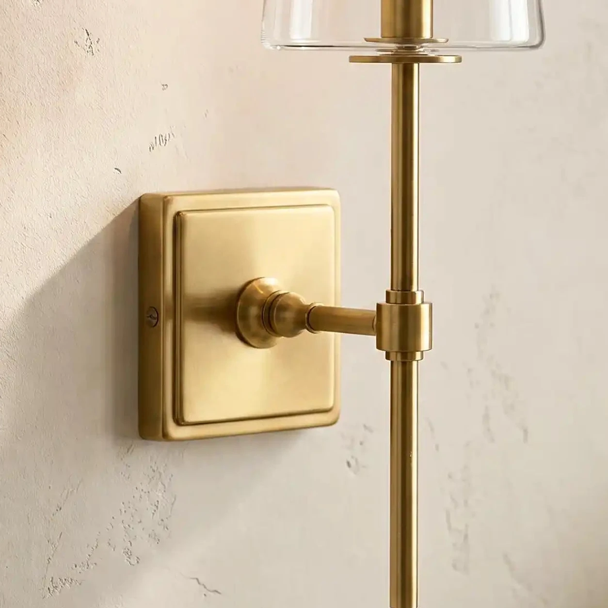 Metal backplate and wall arm detail