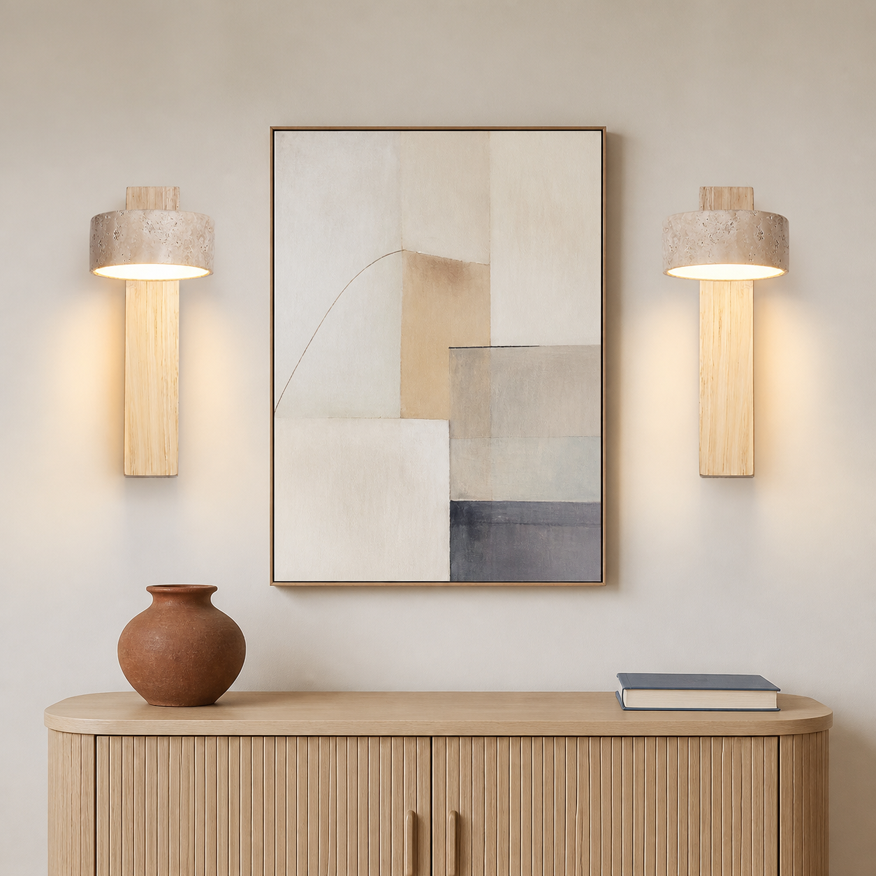 Light wood sconces beside living room artwork
