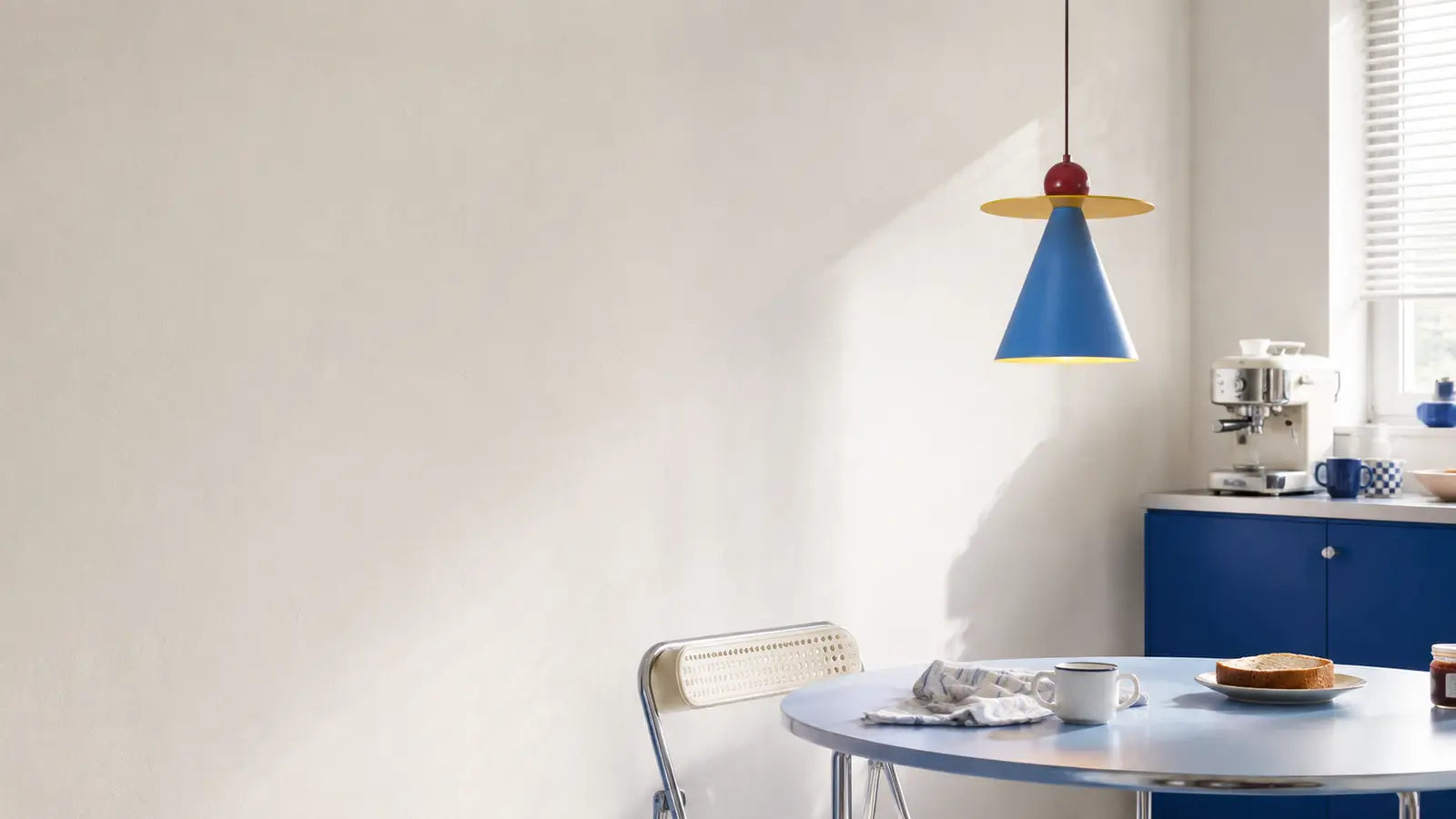 Zelara Memphis Cone Metal Pendant Light in a bright interior