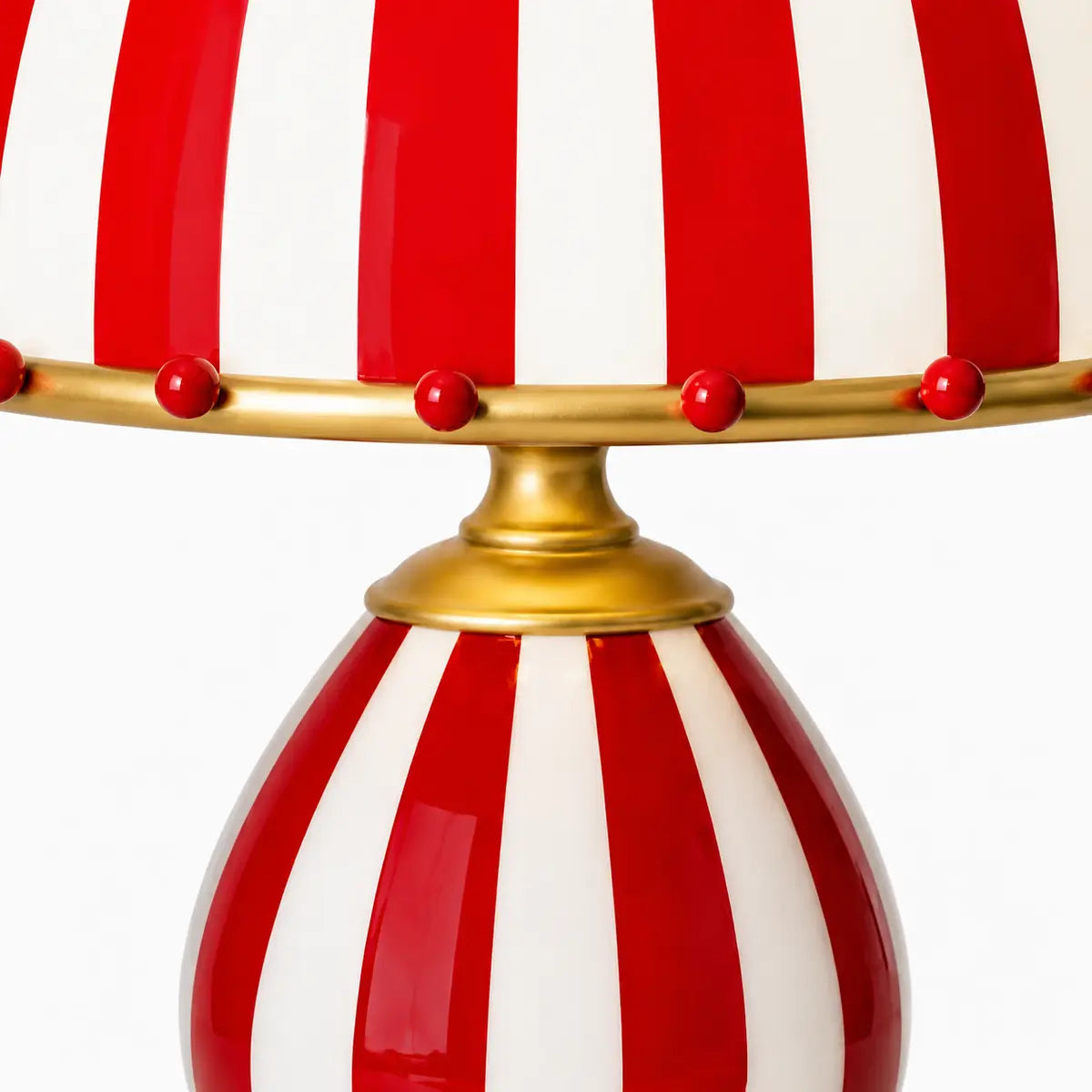 Odette gold neck joining the striped shade and base