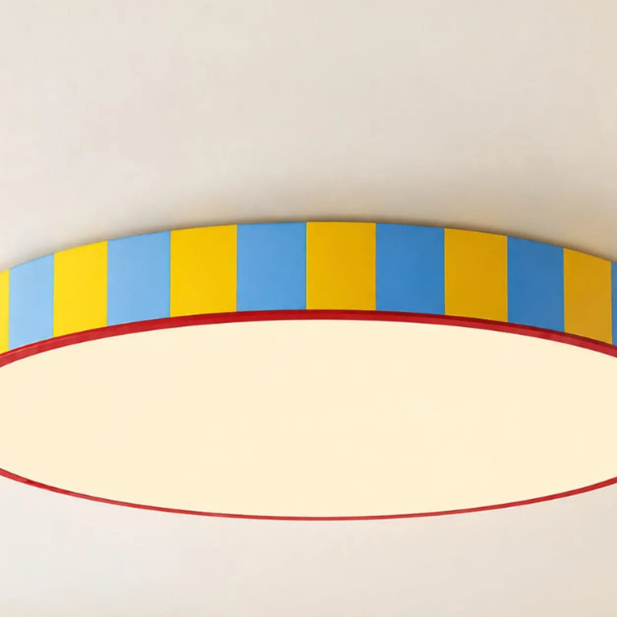 Close detail of the slim striped profile and acrylic diffuser