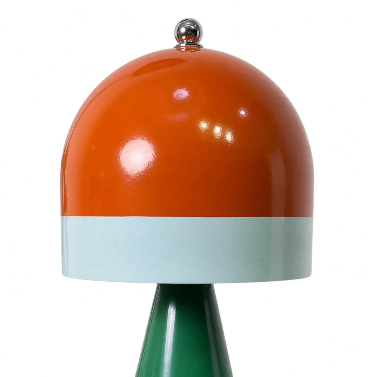 Close detail of Elodie glossy orange glass shade and pale blue band
