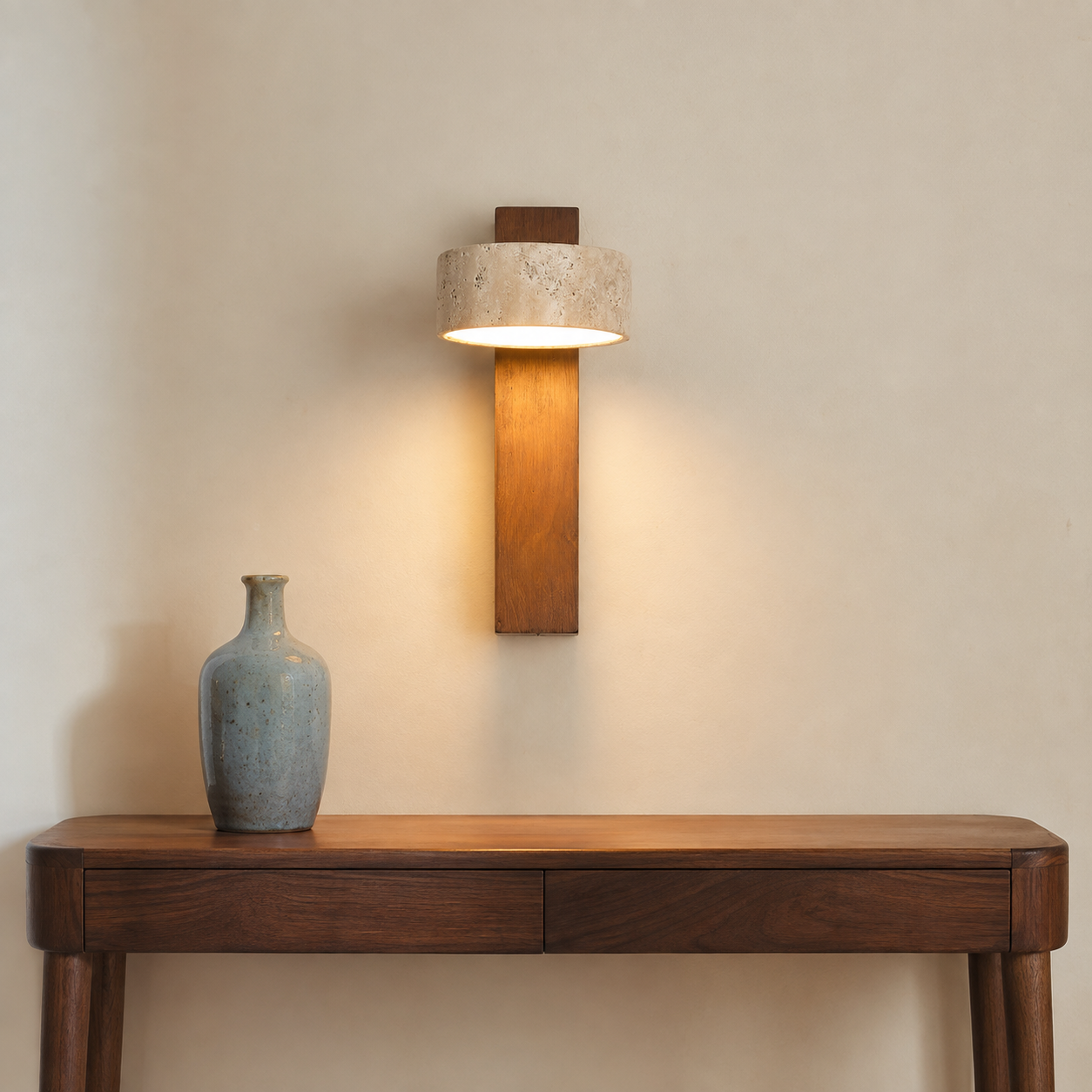 Walnut travertine wall sconce in entryway