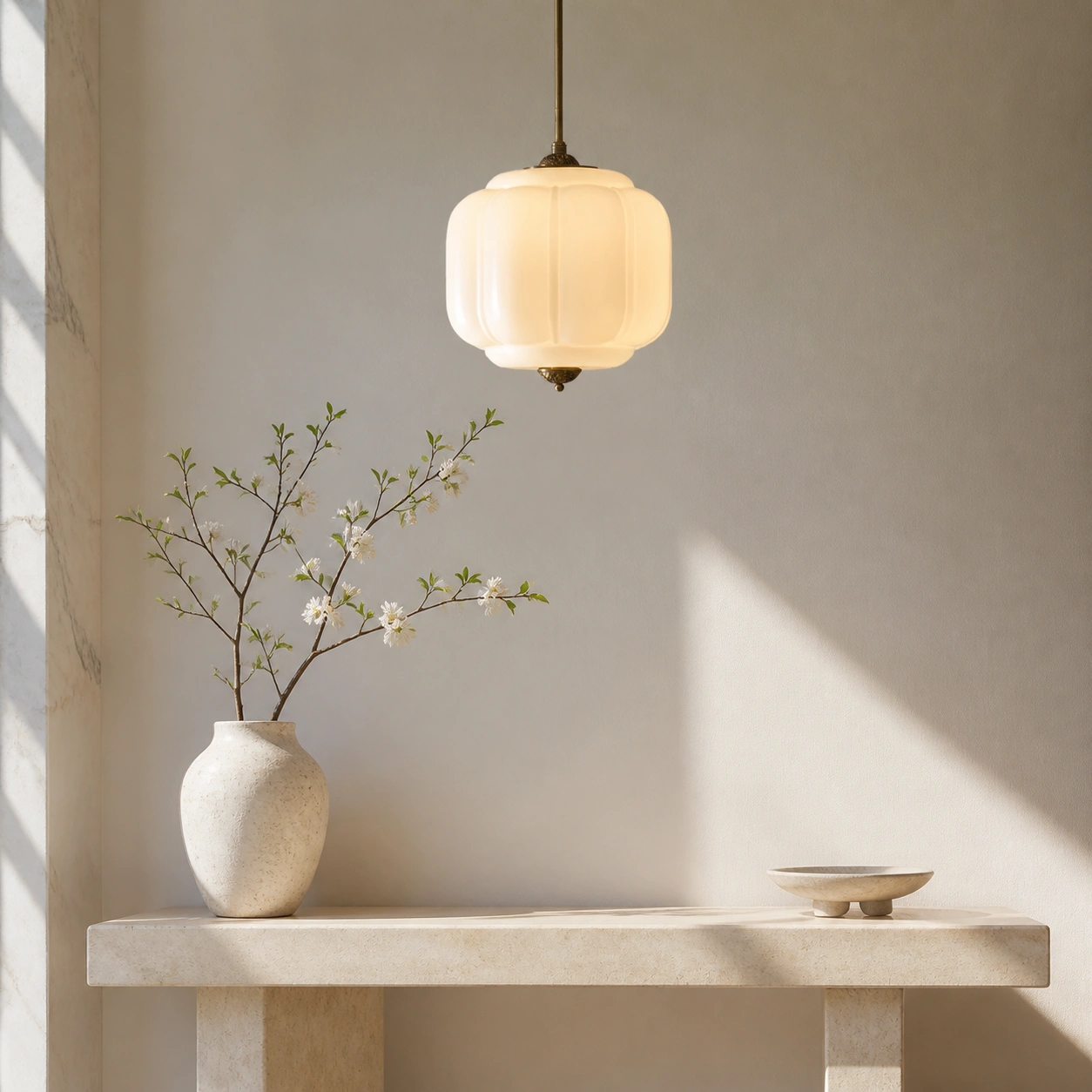 White pendant above a console