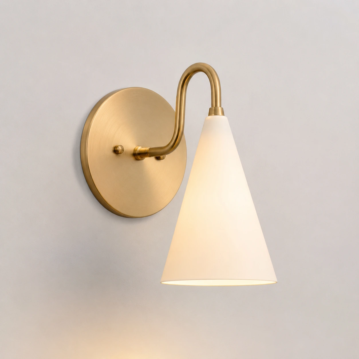 Cream / Sealed Brass wall sconce switched on