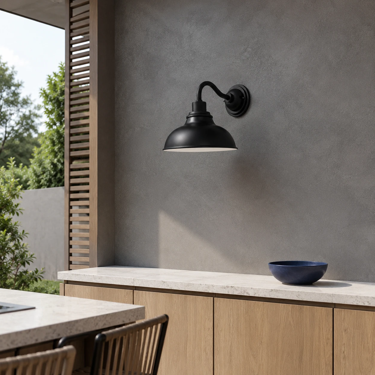 Rowen dome wall sconce in a modern outdoor kitchen