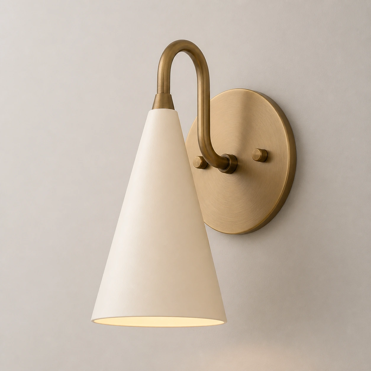 Cream / Antique Brass wall sconce switched on