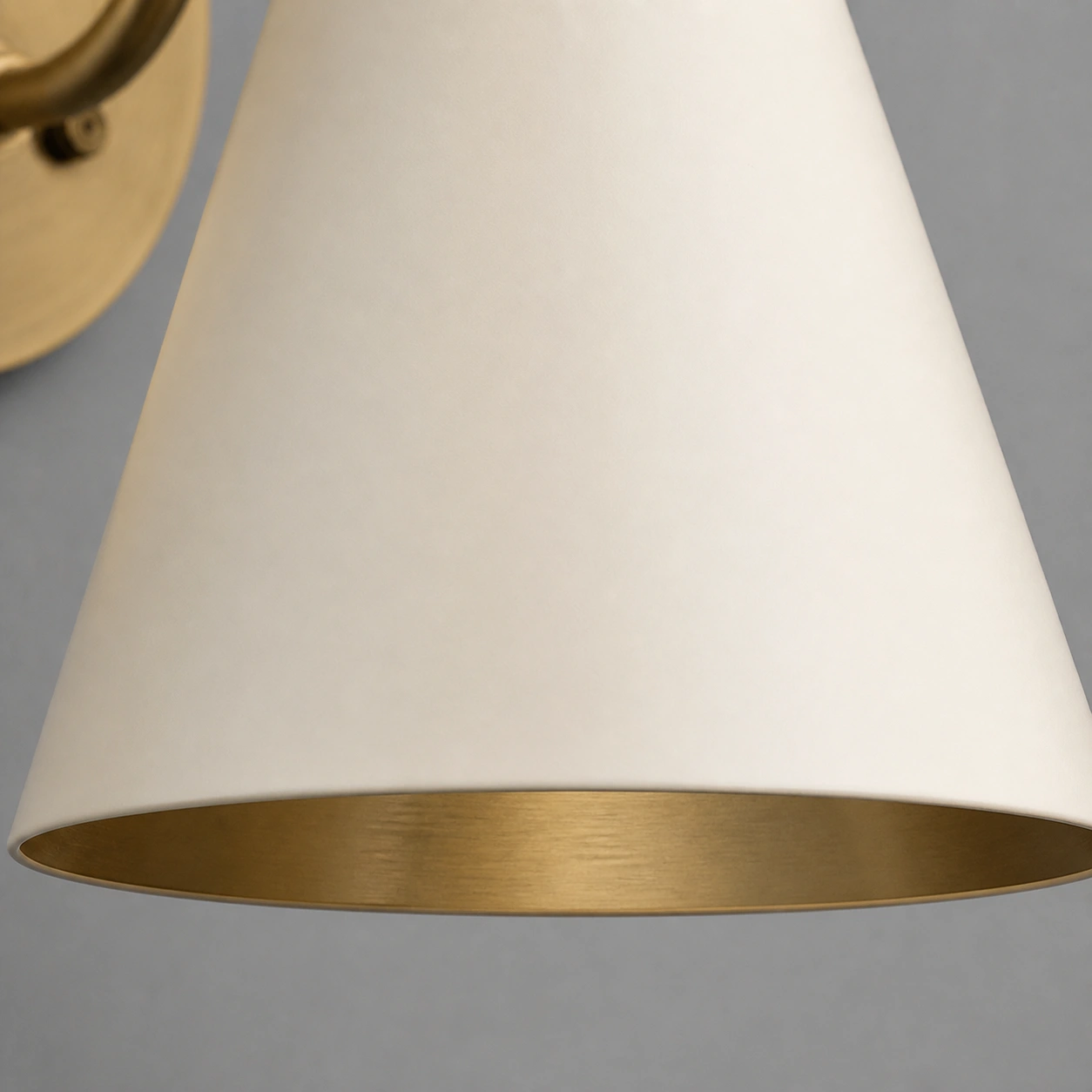 Close detail of cream tapered metal shade
