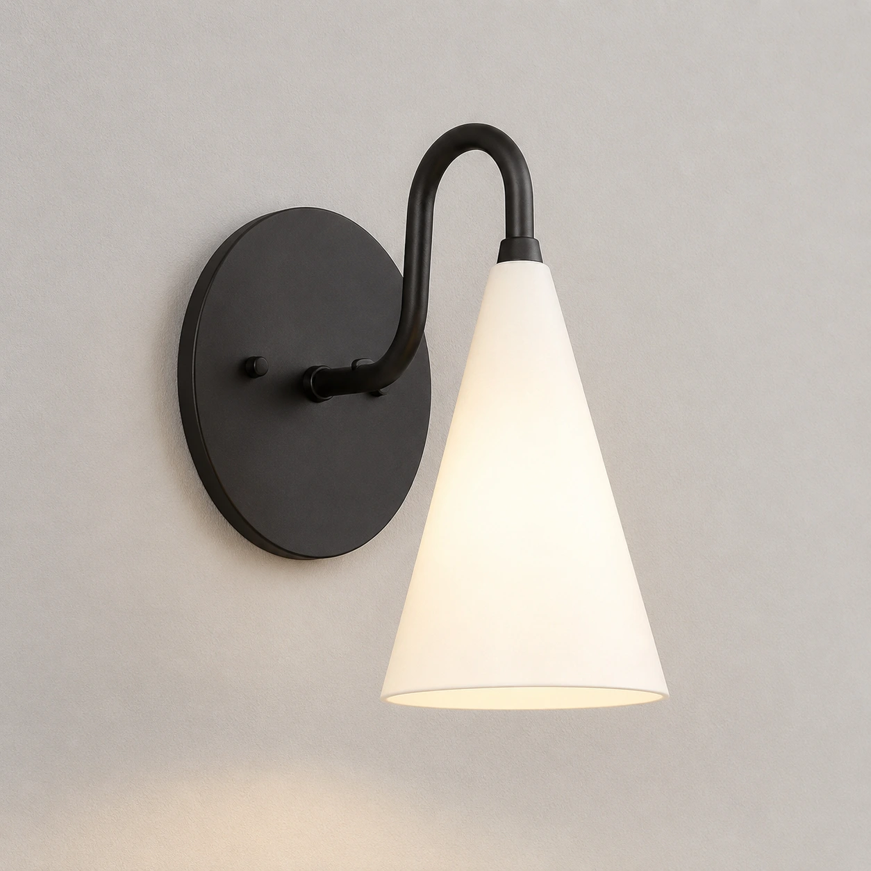 White / Black wall sconce switched on