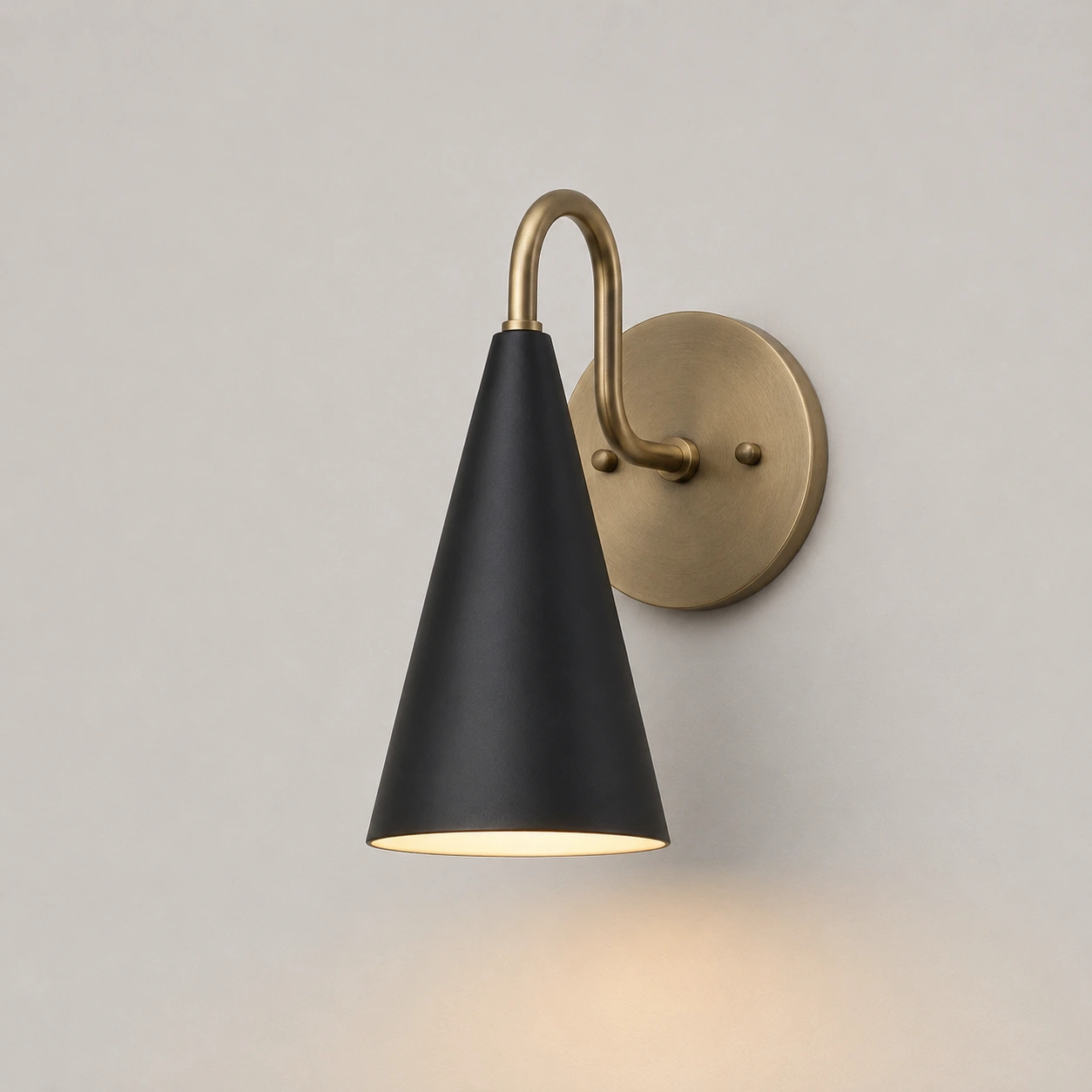 Black / Antique Brass wall sconce switched on
