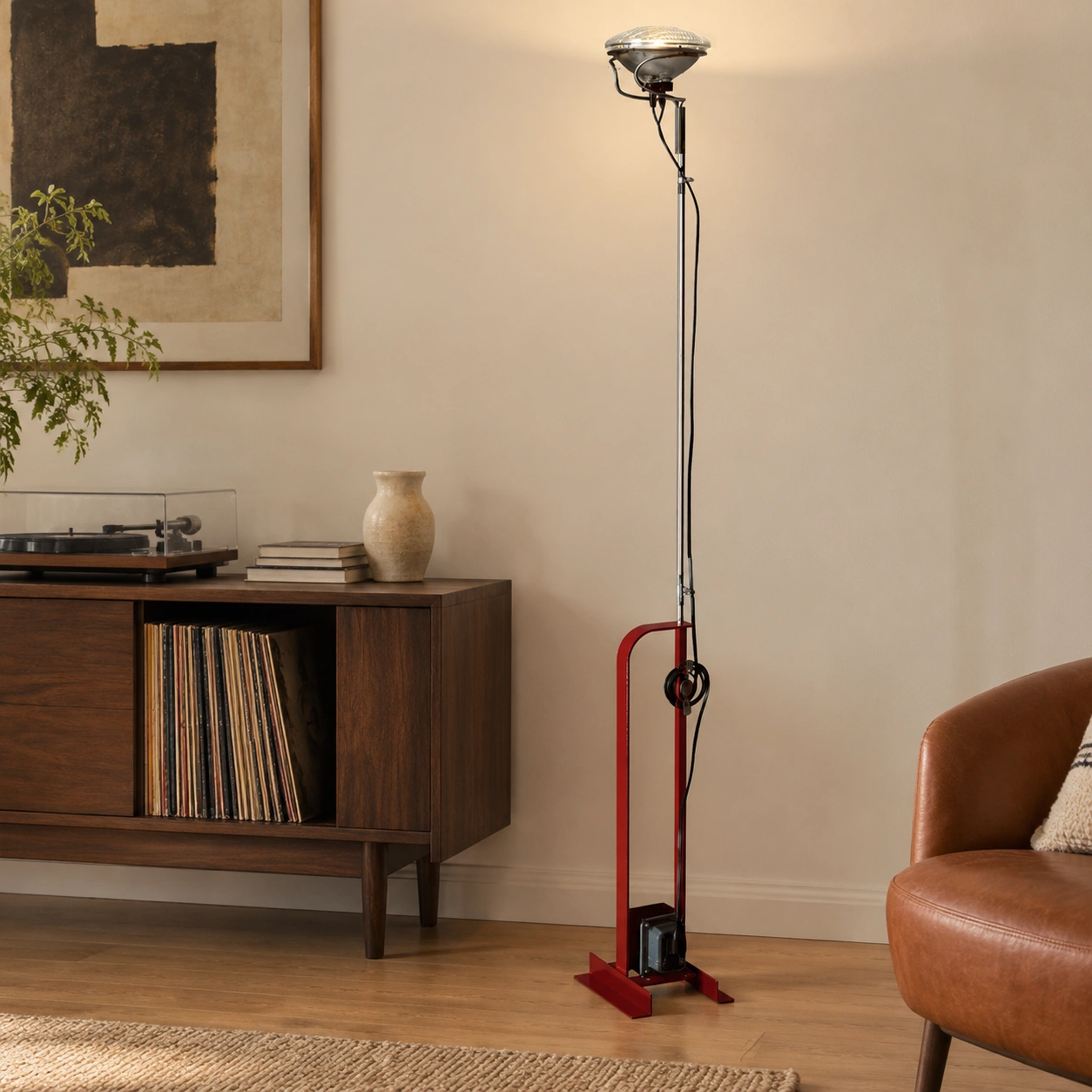 Dieter Toio red floor lamp beside a modern walnut console