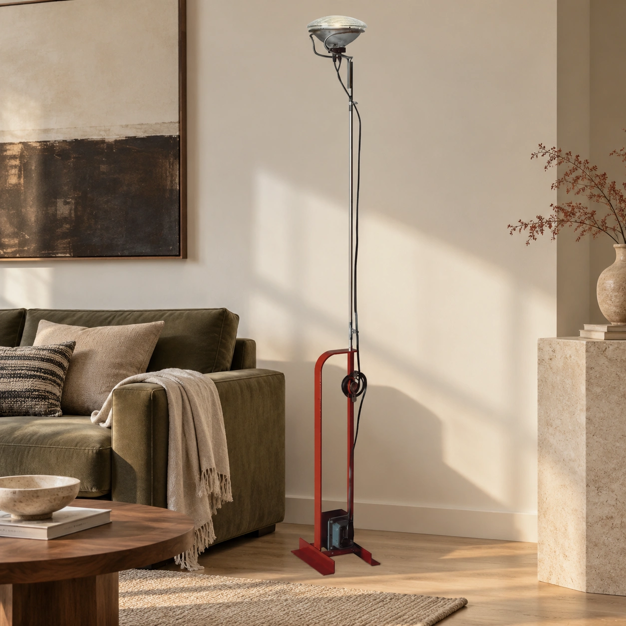 Dieter Toio red floor lamp beside a sofa