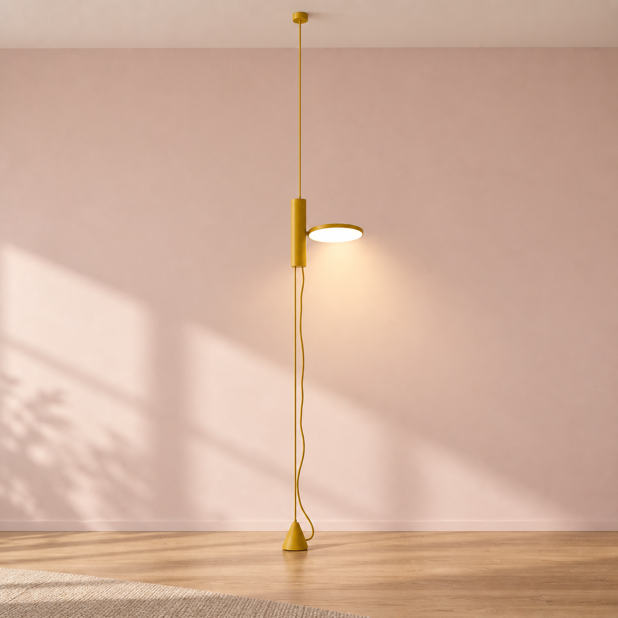 Yellow Dieter floor lamp switched on in a minimal studio