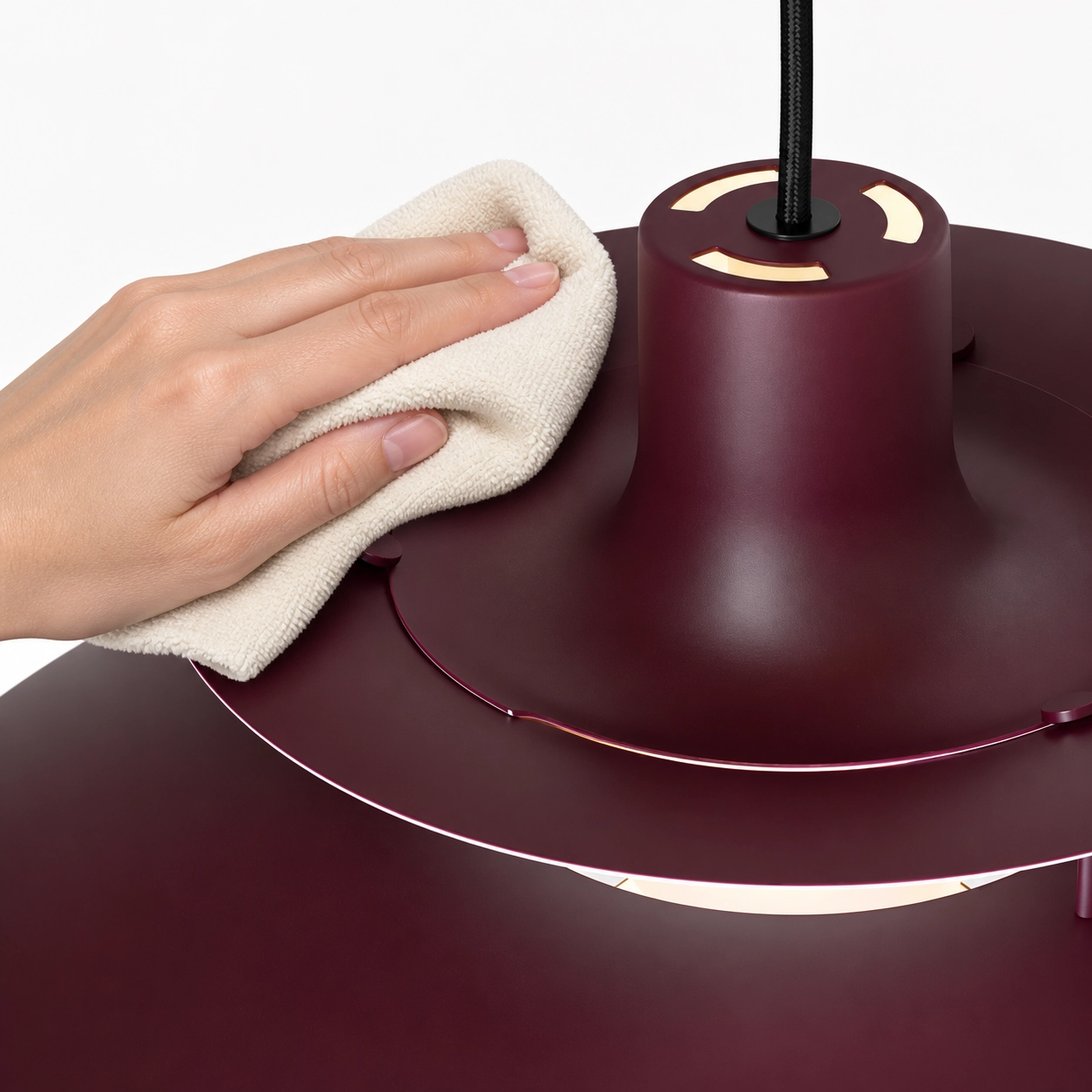 Soft cloth wiping the pendant lamp surface
