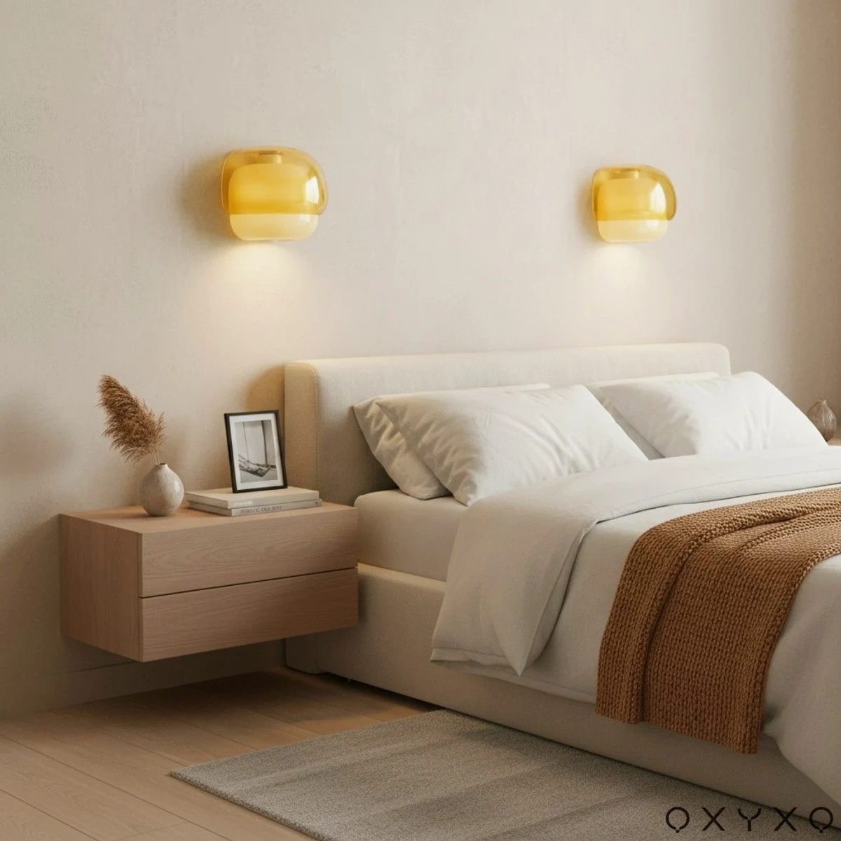 Yellow wall sconces in a bedroom