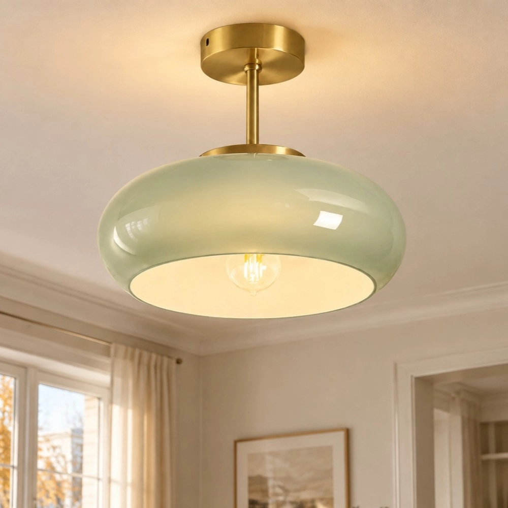 Green ceiling light over a dining table