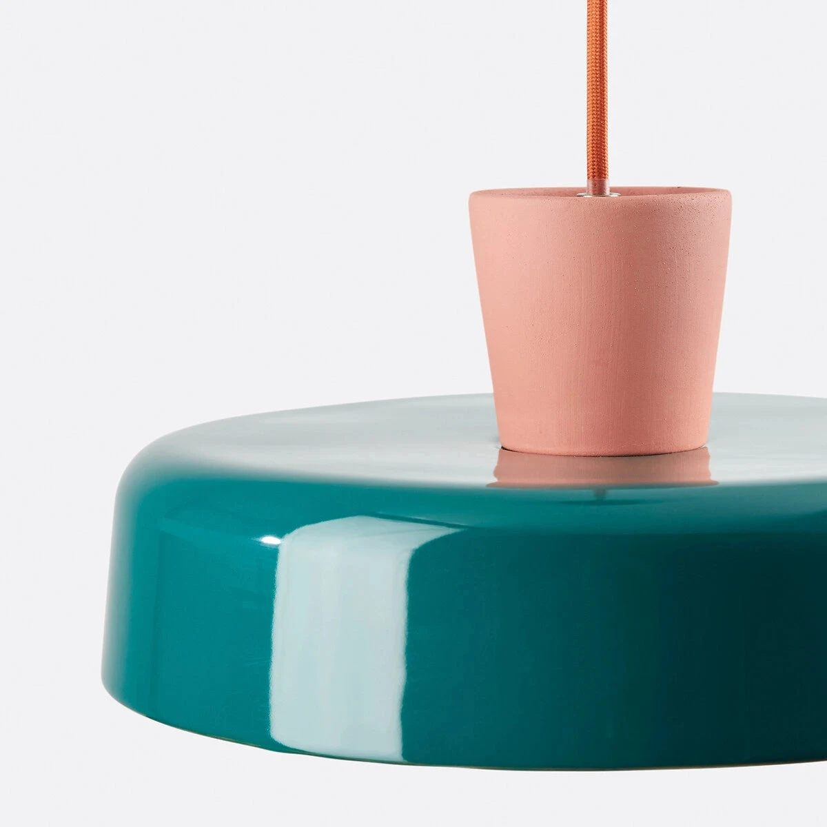 Side profile showing the rounded iron pendant shade