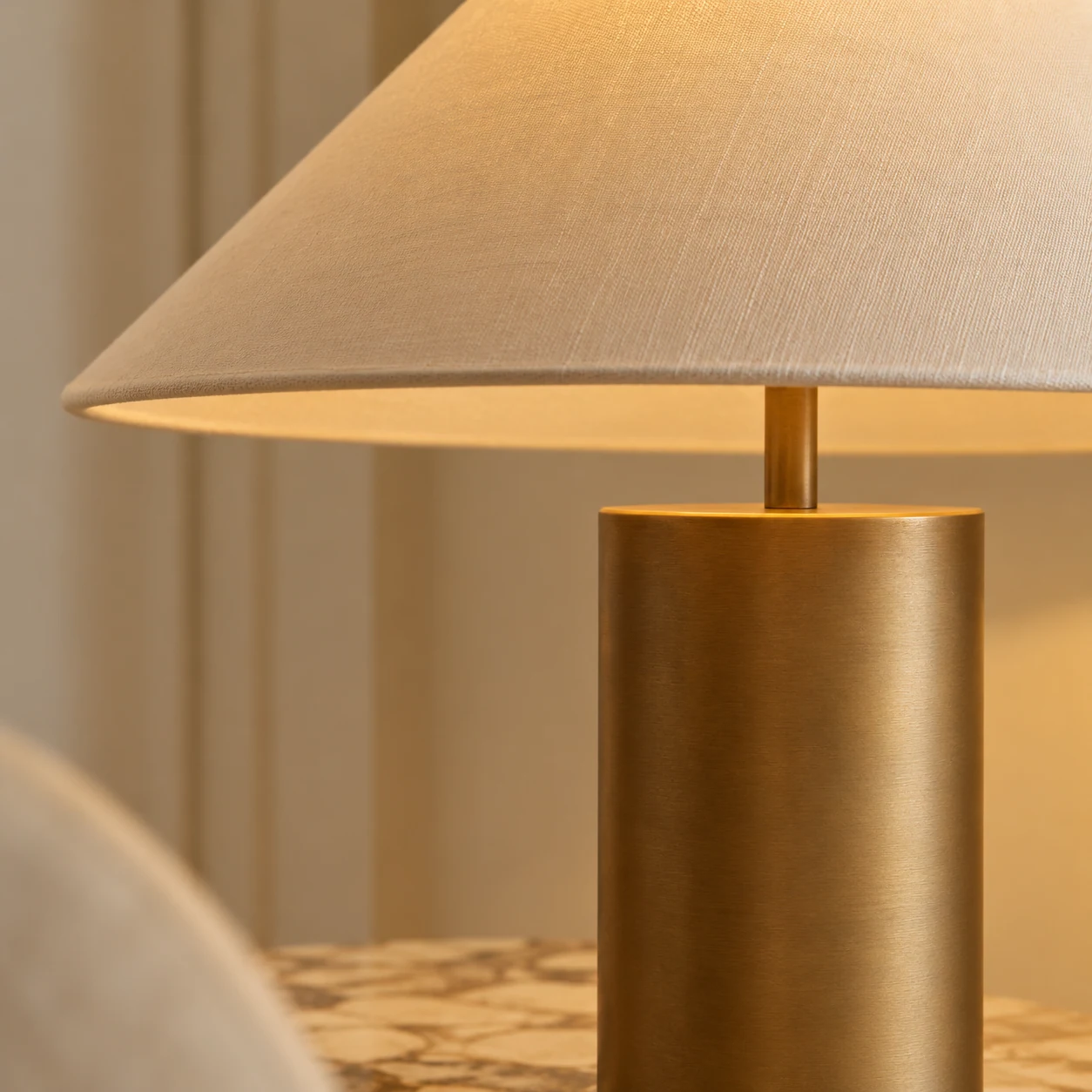 Close-up of the Bleeker linen shade and aged brass base
