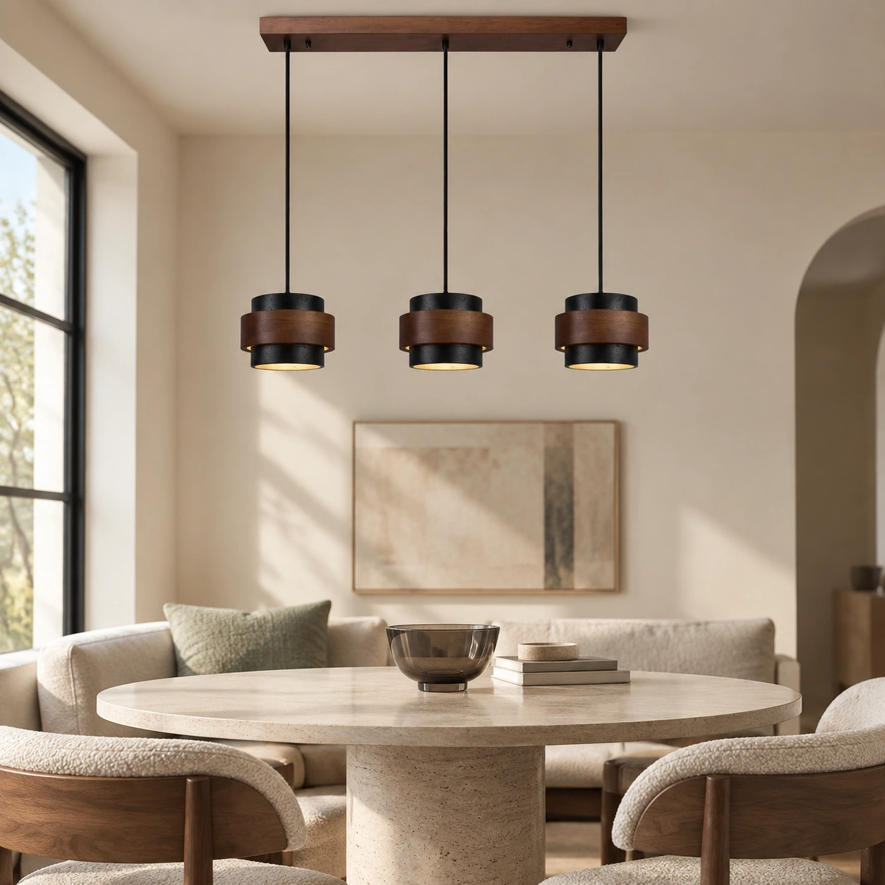 Three-head black pendant in a lounge dining room