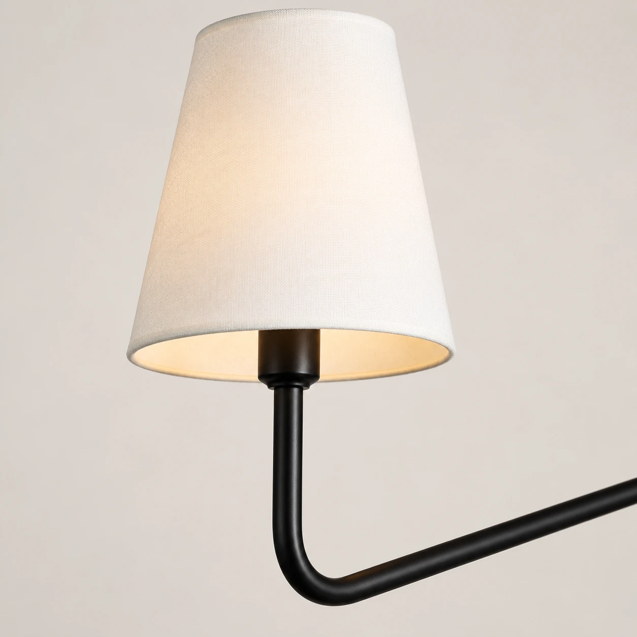 Four-light linear chandelier White Shades shared detail