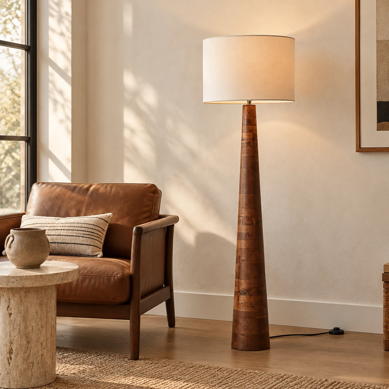 Marlow Rustic Carved Wood Floor Lamp — Carved wood floor lamp beside a reading chair