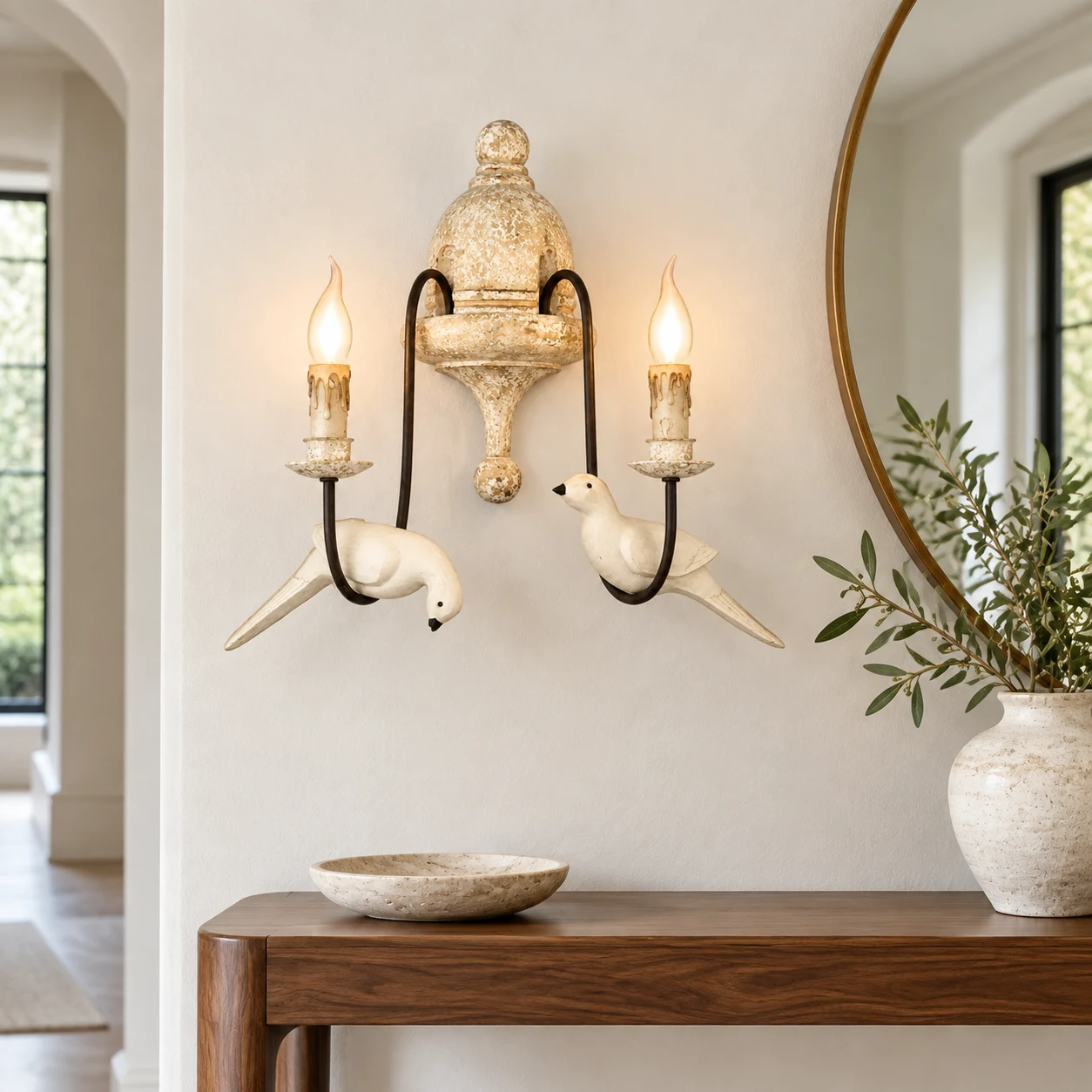 Mara French country bird-motif double-head wall light in a residential entry