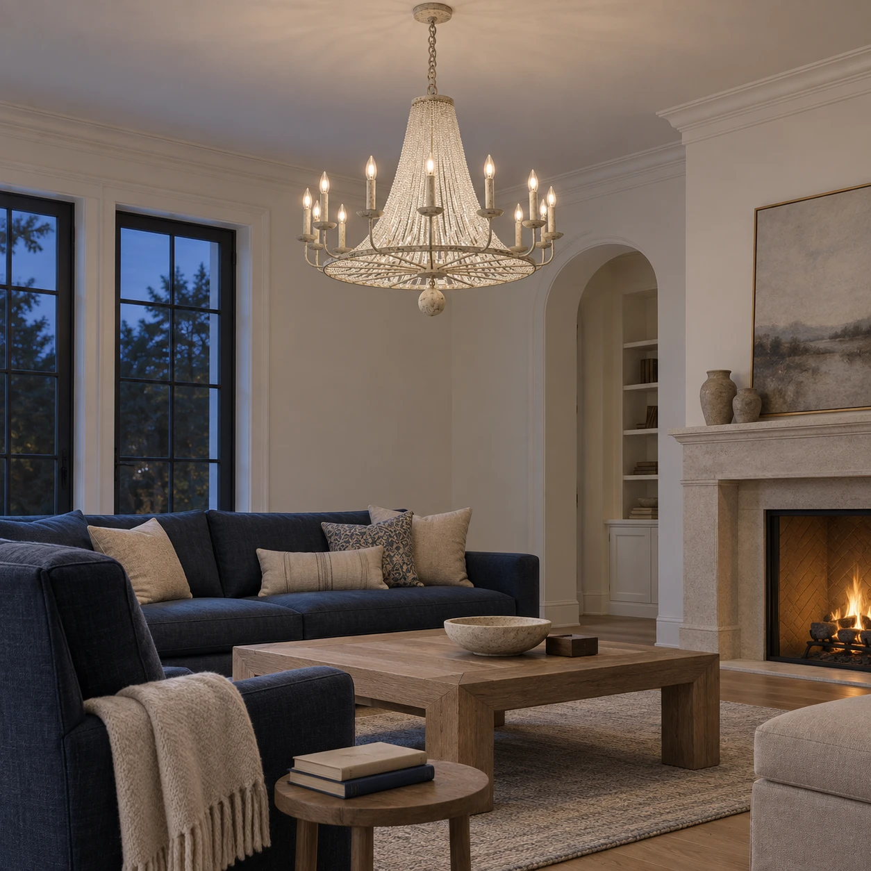 14-light French country crystal bead chandelier in a living room at dusk