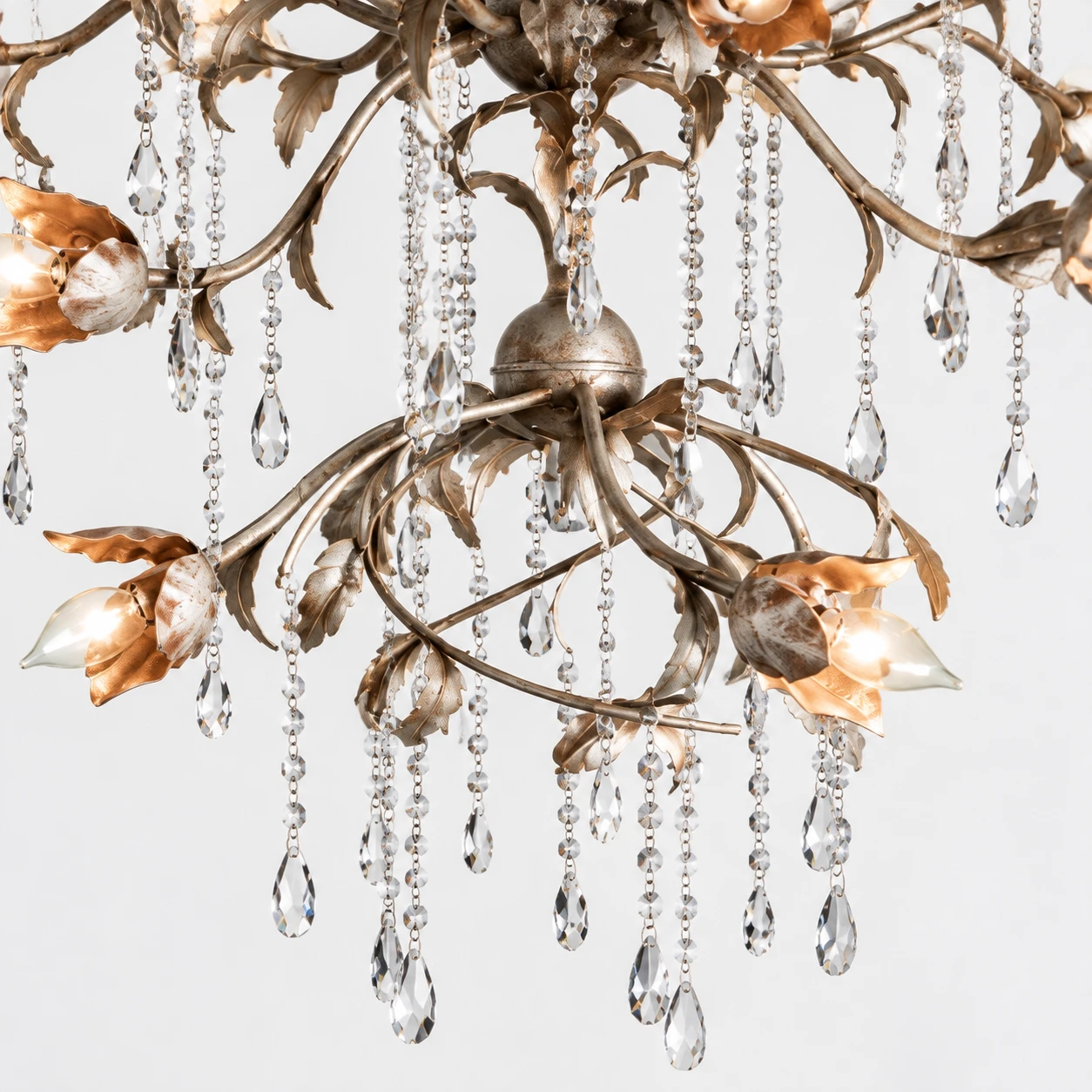 Lower tier and crystal strands detail in distressed silver
