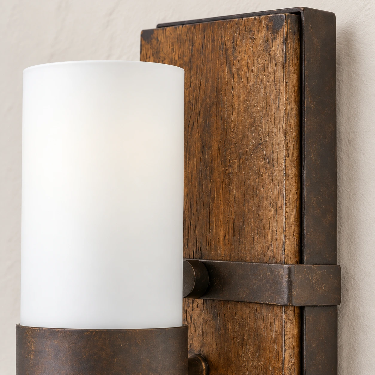 Carved walnut wood backplate and aged metal collar detail