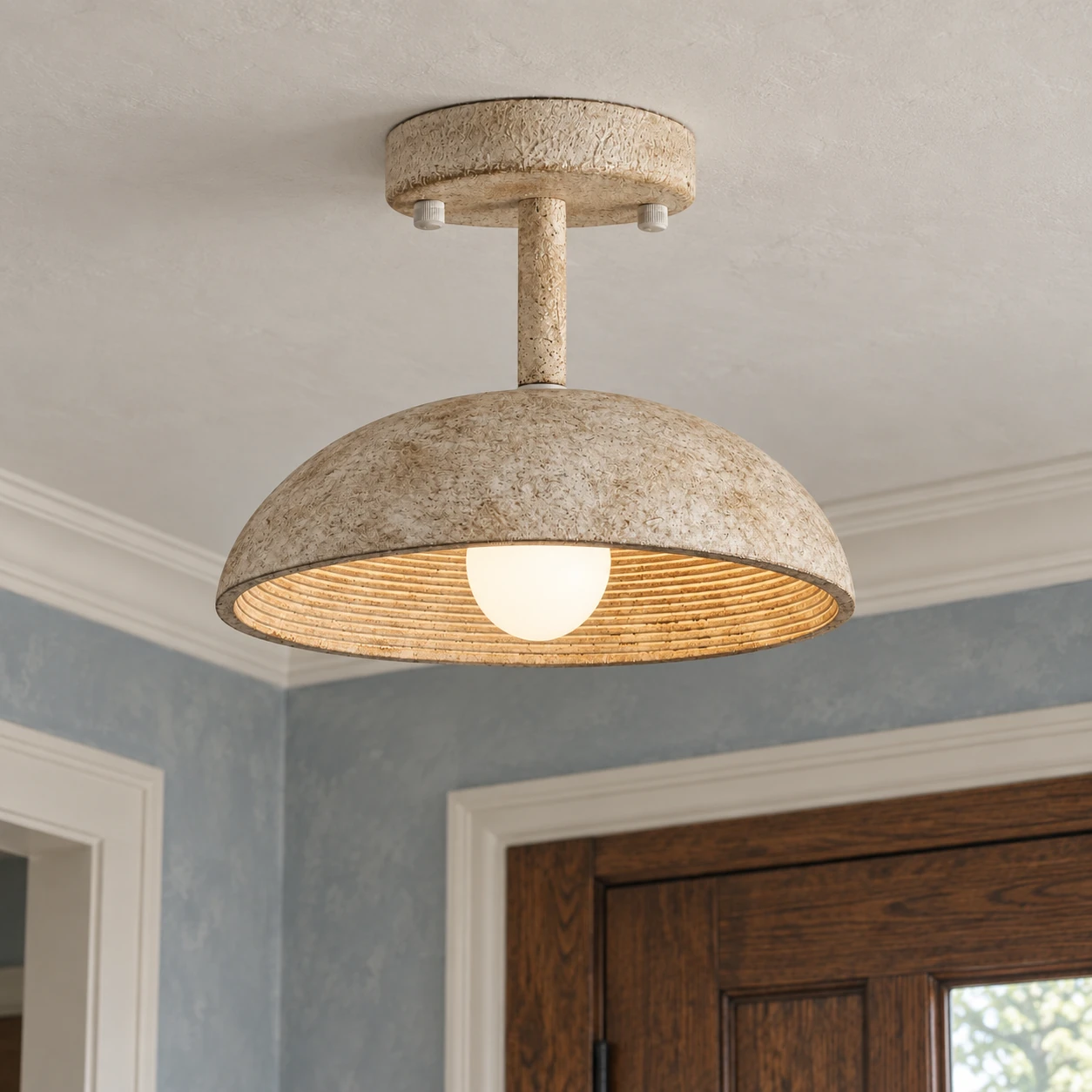 Close view of the Clara ceiling light textured resin shade