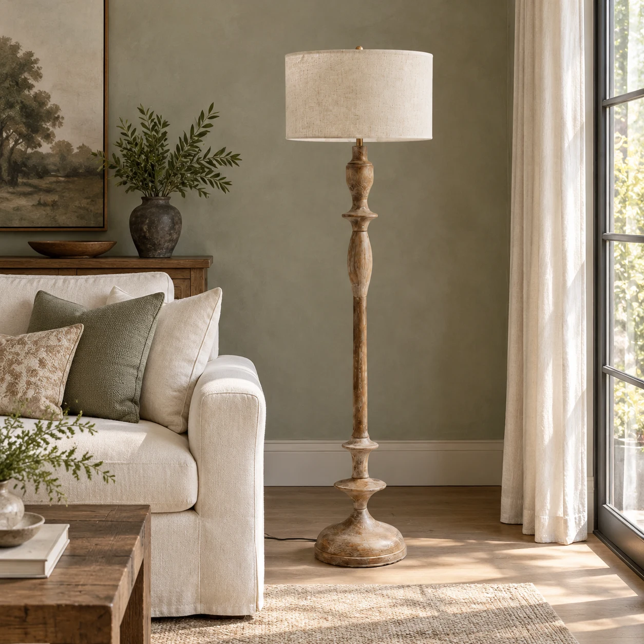 Camille French country turned-wood floor lamp in a linen sofa corner