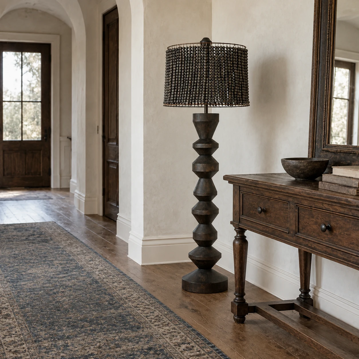 Dark wood beaded floor lamp in a hallway