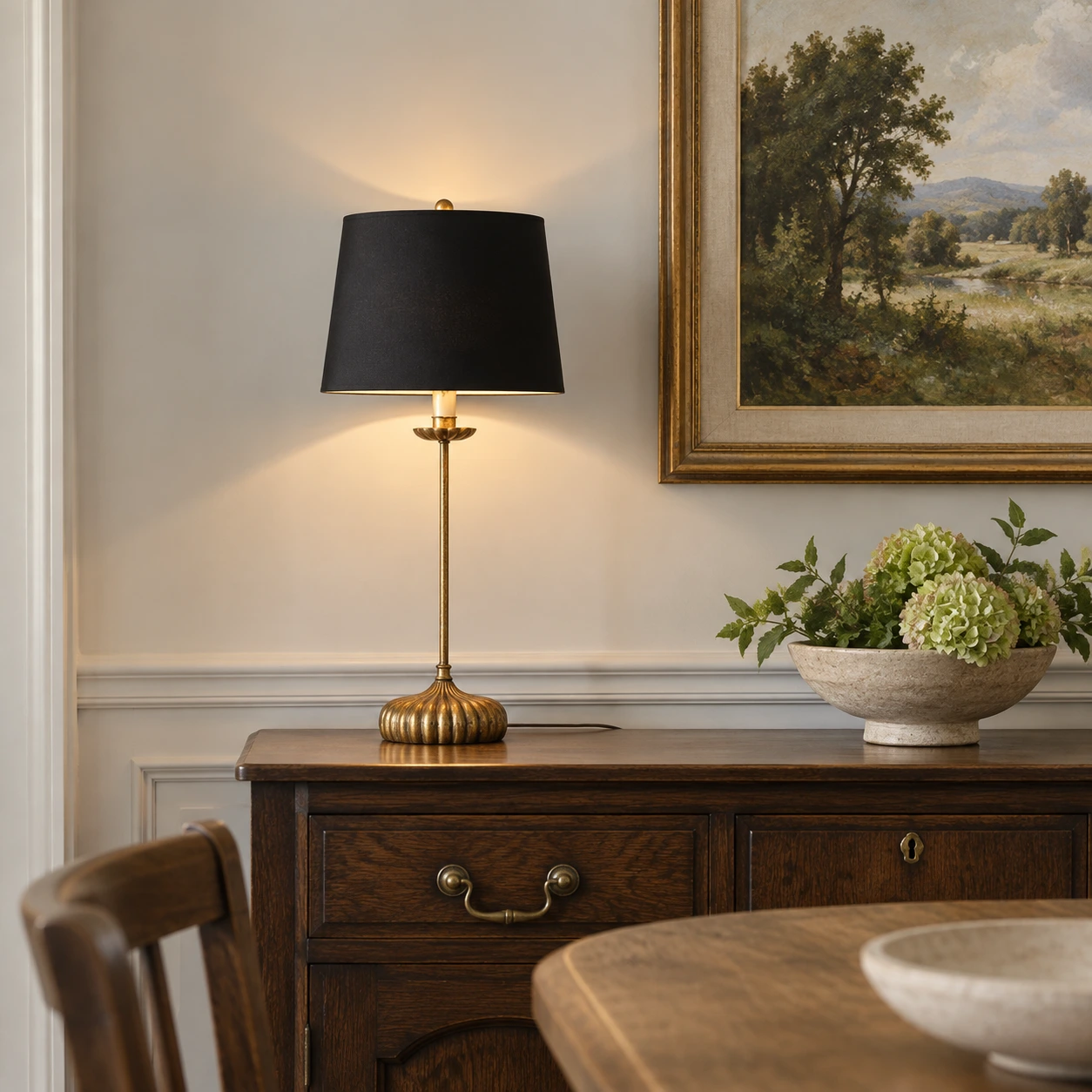 Distressed iron table lamp beside a dining setting