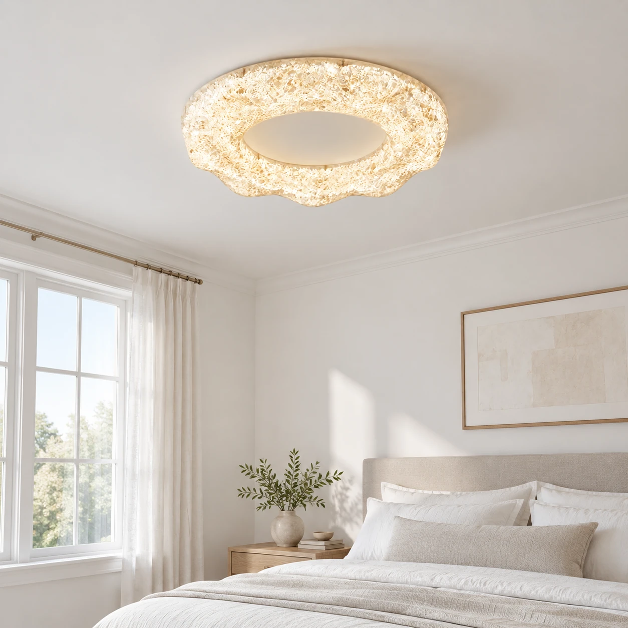 Clara sand white sculpted resin flush mount ceiling light in a bedroom