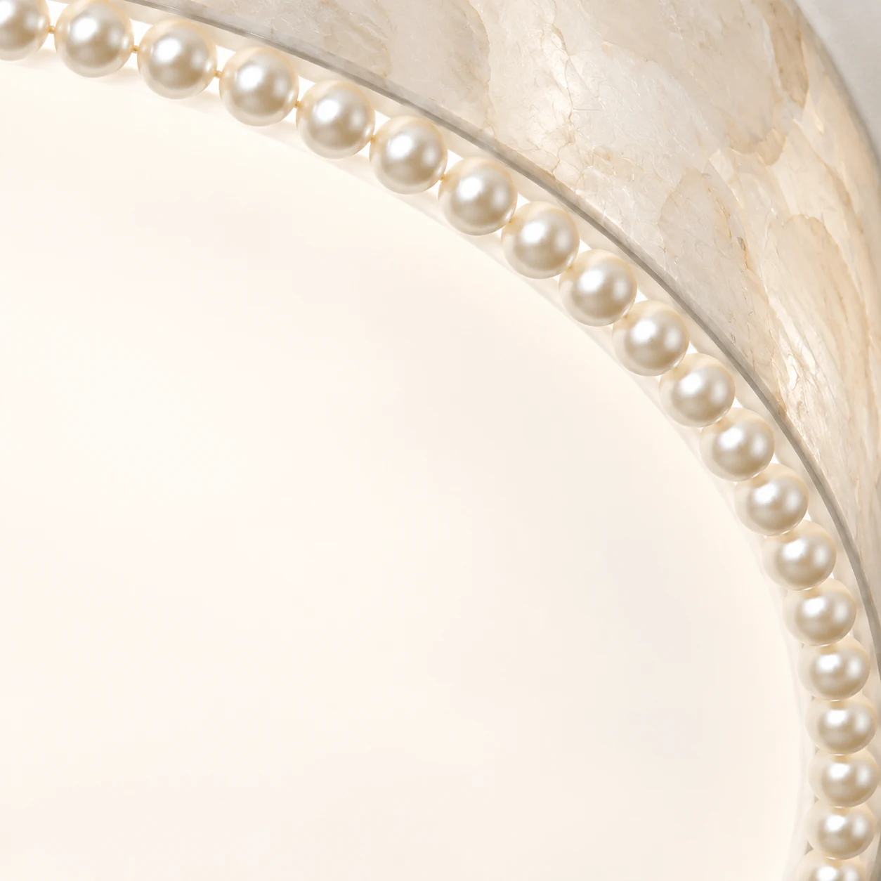 Faux pearl trim and milky acrylic diffuser close-up